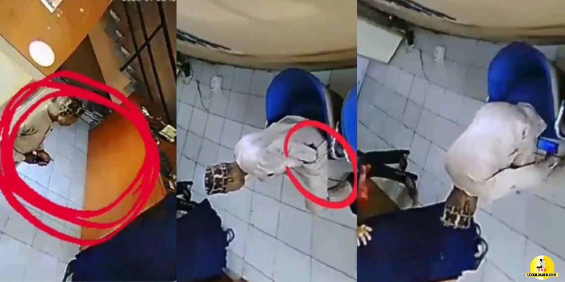 Moment A Well Dressed Man Was Was Captured On CCTV Camera Stealing A Phone In An Office (Video)