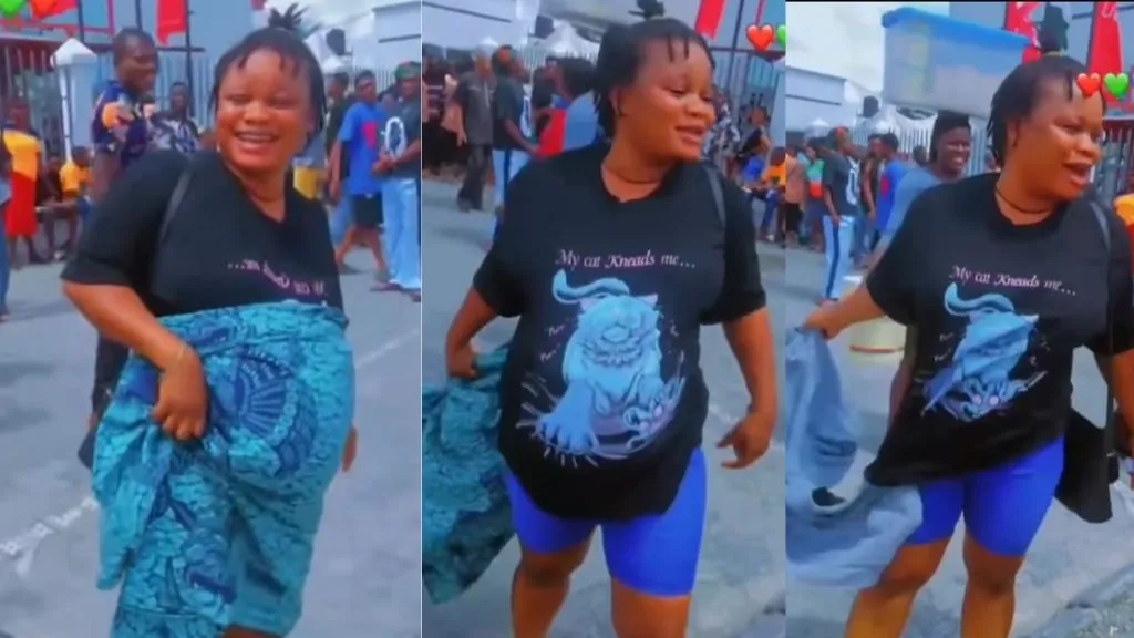 Naira Scarcity: Moment woman escapes a long queue after pretending to be pregnant so as to get cash, video trends (Watch)